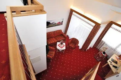 Ein Sitzbereich in der Unterkunft Landhotel Böld Oberammergau