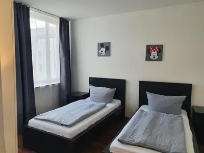 Ein Bett oder Betten in einem Zimmer der Unterkunft New City Center Stays 1