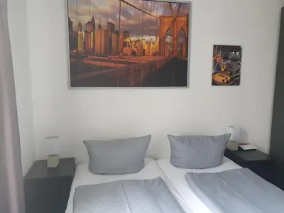 Ein Bett oder Betten in einem Zimmer der Unterkunft New City Center Stays 1
