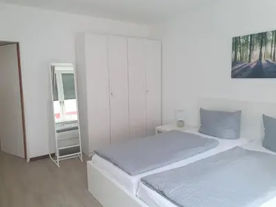 Ein Bett oder Betten in einem Zimmer der Unterkunft New City Center Stays 1
