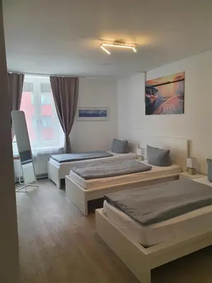 Ein Bett oder Betten in einem Zimmer der Unterkunft New City Center Stays 1