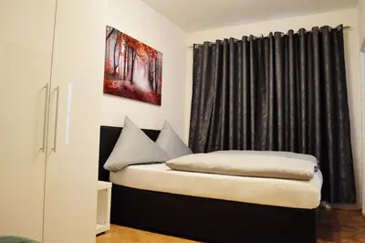 Ein Bett oder Betten in einem Zimmer der Unterkunft New City Center Stays 2