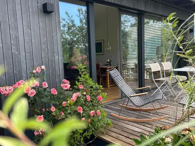 Ein Garten an der Unterkunft Guesthouse Paradies Samerberg