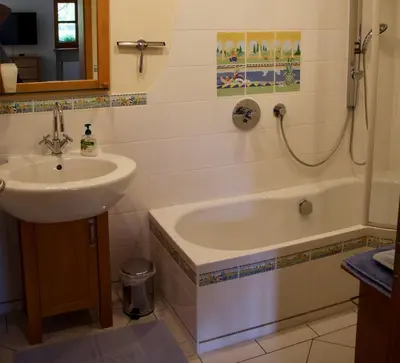 Ein Badezimmer in der Unterkunft Ferienwohnung Fanese