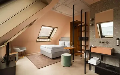 Ein Bett oder Betten in einem Zimmer der Unterkunft Hotel Miano by Limehome
