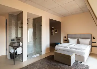 Ein Bett oder Betten in einem Zimmer der Unterkunft Hotel Miano by Limehome