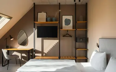 Ein Bett oder Betten in einem Zimmer der Unterkunft Hotel Miano by Limehome