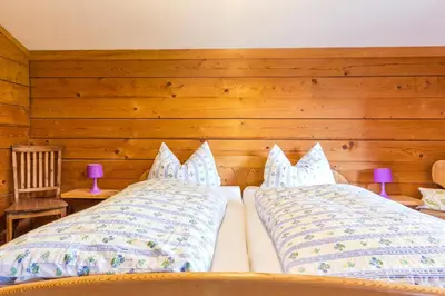 Ein Bett oder Betten in einem Zimmer der Unterkunft Hafnerhof
