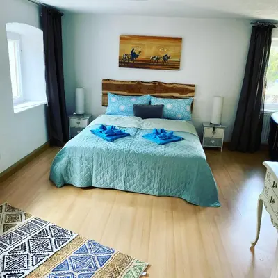 Ein Bett oder Betten in einem Zimmer der Unterkunft Ferienhaus-Aladdin