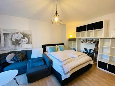 Ein Bett oder Betten in einem Zimmer der Unterkunft Exclusive Maxvorstadt Studio