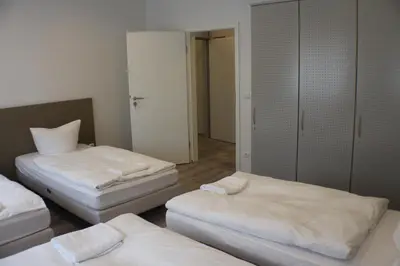 Ein Bett oder Betten in einem Zimmer der Unterkunft Slamba Hostel