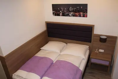 Ein Bett oder Betten in einem Zimmer der Unterkunft Slamba Hostel