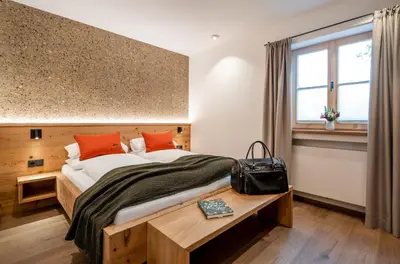 Ein Bett oder Betten in einem Zimmer der Unterkunft Alperie Ferienhaus