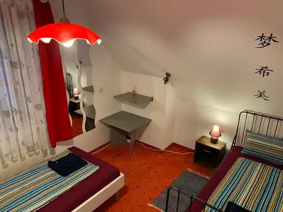 Ein Bett oder Betten in einem Zimmer der Unterkunft Ferienwohnung Dinkelscherben