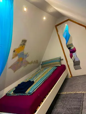 Ein Bett oder Betten in einem Zimmer der Unterkunft Ferienwohnung Dinkelscherben