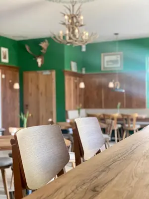 Ein Restaurant oder anderes Speiselokal in der Unterkunft Hotel Waitzingers
