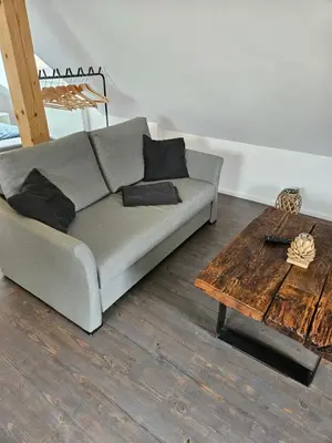 Ein Sitzbereich in der Unterkunft Ferienwohnung Klettham