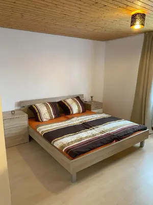 Ein Bett oder Betten in einem Zimmer der Unterkunft Chiemsee - Idyll
