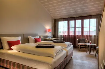 Ein Bett oder Betten in einem Zimmer der Unterkunft Hotel zur Post