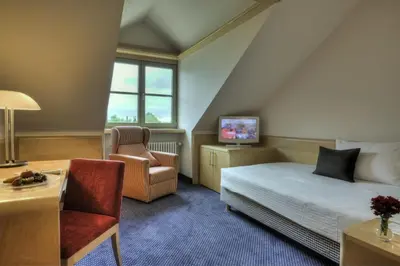 Ein Sitzbereich in der Unterkunft Hotel zur Post