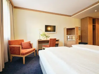 Ein Bett oder Betten in einem Zimmer der Unterkunft Hotel zur Post