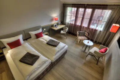 Ein Bett oder Betten in einem Zimmer der Unterkunft Hotel zur Post