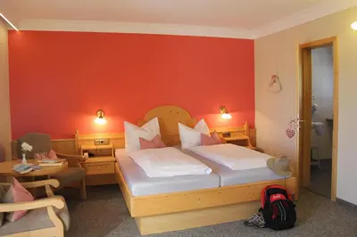 Ein Bett oder Betten in einem Zimmer der Unterkunft Kleines Hotel Edeltraud