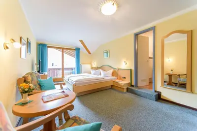 Ein Bett oder Betten in einem Zimmer der Unterkunft Kleines Hotel Edeltraud