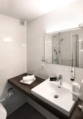 Ein Badezimmer in der Unterkunft Hotel Fischerwirt
