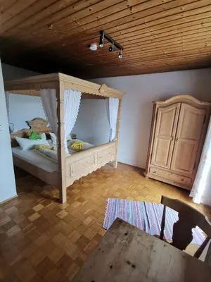 Ein Bett oder Betten in einem Zimmer der Unterkunft Hotel Garni Austermayer