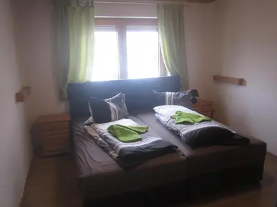 Ein Bett oder Betten in einem Zimmer der Unterkunft Hotel Garni Austermayer