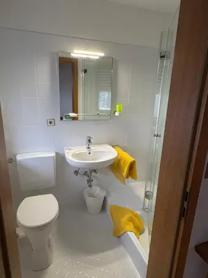 Ein Badezimmer in der Unterkunft Hotel Garni Austermayer