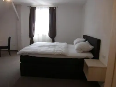 Ein Bett oder Betten in einem Zimmer der Unterkunft Pension Lechner