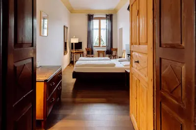 Ein Bett oder Betten in einem Zimmer der Unterkunft Hirzinger - Gasthaus und Hotel