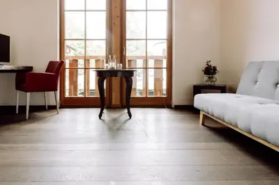 Ein Bett oder Betten in einem Zimmer der Unterkunft Hirzinger - Gasthaus und Hotel