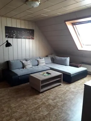 Ein Sitzbereich in der Unterkunft Ferienwohnung Heigemeir