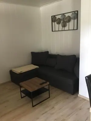 Ein Sitzbereich in der Unterkunft Ferienwohnung Heigemeir