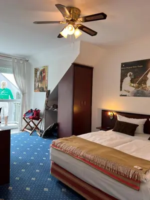 Ein Bett oder Betten in einem Zimmer der Unterkunft Runas Air Muc Park Sleep & Fly