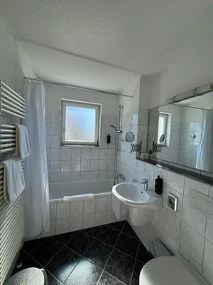 Ein Badezimmer in der Unterkunft Runas Air Muc Park Sleep & Fly