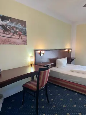 Ein Bett oder Betten in einem Zimmer der Unterkunft Runas Air Muc Park Sleep & Fly