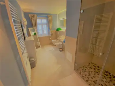 Ein Badezimmer in der Unterkunft Ferienwohnung Giacomelli 4