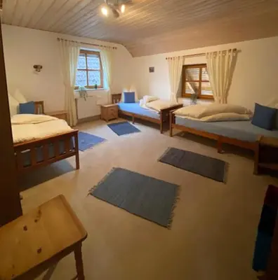 Ein Bett oder Betten in einem Zimmer der Unterkunft Landhaus in Pförring
