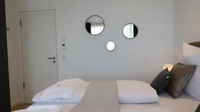 Ein Bett oder Betten in einem Zimmer der Unterkunft MUNICH FINEST APARTMENTS