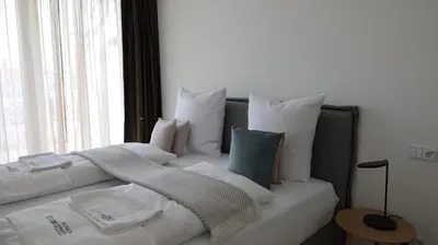 Ein Bett oder Betten in einem Zimmer der Unterkunft MUNICH FINEST APARTMENTS