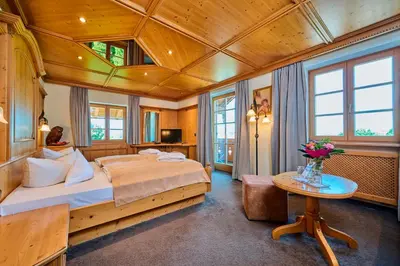 Ein Bett oder Betten in einem Zimmer der Unterkunft Hotel Happinger Hof