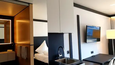 Ein Bett oder Betten in einem Zimmer der Unterkunft AM Hotel by WMM Hotels