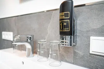 Ein Badezimmer in der Unterkunft Berghotel & Chalets Adersberg Chiemgau Card kostenfrei