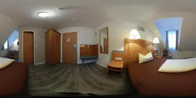 Ein Bett oder Betten in einem Zimmer der Unterkunft Am Klostergarten