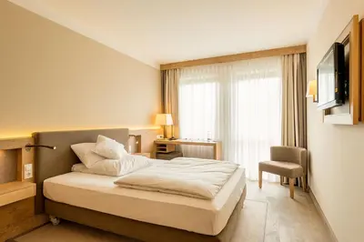 Ein Bett oder Betten in einem Zimmer der Unterkunft Bauer Hotel und Restaurant