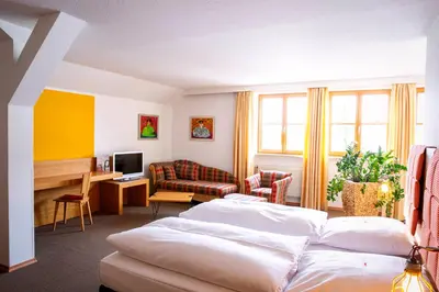 Ein Bett oder Betten in einem Zimmer der Unterkunft Hotel Gut Schwaige